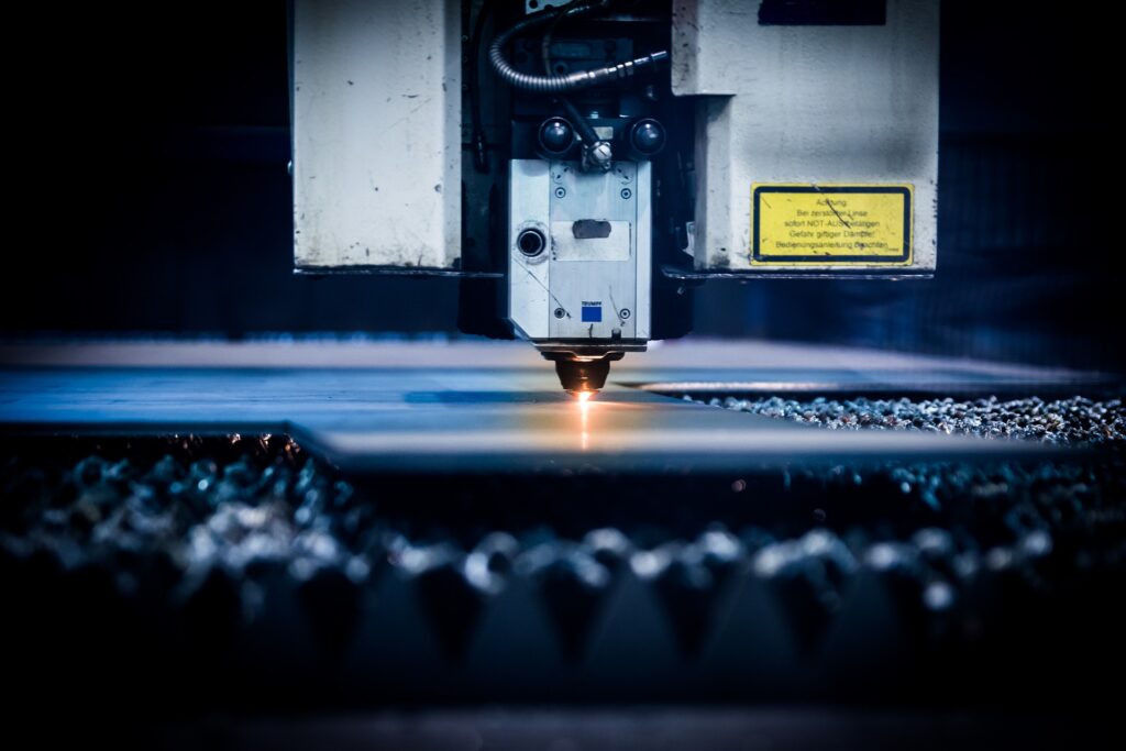 closeup of a plasma laser cutter CNC machine