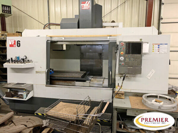HAAS VF-6/40 SPECIFICATIONS: X 64" Y 32" Z 30" POWER 20 hp RPM 7,500 RPM # ATC 24 TAPER 40 TABLE-W 64" TABLE-L 28" MADE IN United States # AXIS 3 MAX TABLE LOAD 4,000 lb RAPIDS (X/Y/Z) 540 / 600 / 600 in/min. CONTROL CNC (Haas) DIMENSIONS 195" X 106" X 131" WEIGHT 22,300 lb EQUIPPED WITH: Vector-drive spindle 24+1 side-mount tool changer Programmable coolant nozzle Flood coolant system (360 l) Automatic chip auger 15" color LCD monitor Color remote jog handle 1 MB program memory USB port Memory lock key switch Rigid tapping